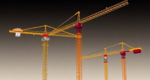 L&rsquo;évolution des grues de chantier au XXIe siècle : de la force brute à l&rsquo;intelligence coordonnée